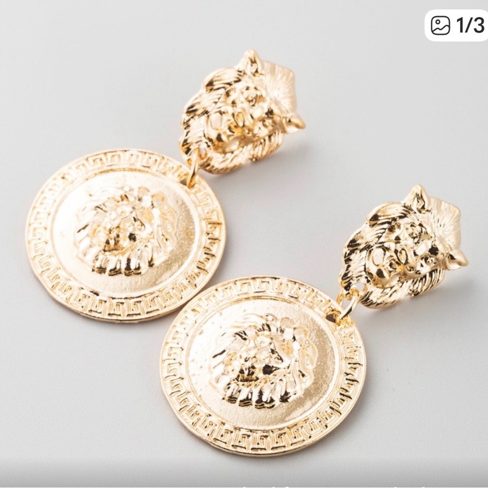 Gold Lion Fashion Head Drop Earrings featuring a lion.